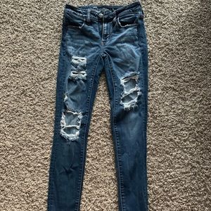 blue ripped jeans